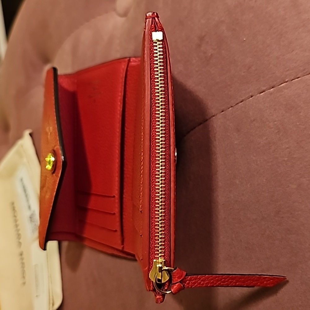 Authentic Louis Vuitton Victorine Empreinte Trifold Leather Wallet - Picture 12 of 16